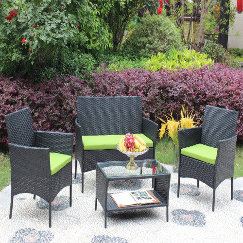4-Piece Rattan Patio Furniture Set with Green Cushions