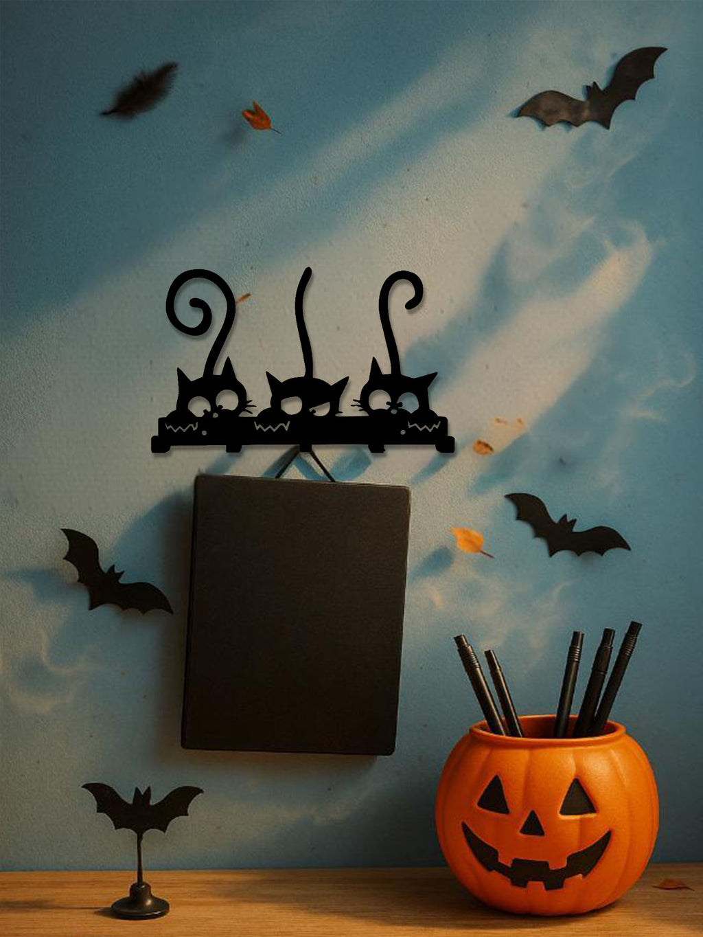 vintage black metal wall coat in use lifestyle