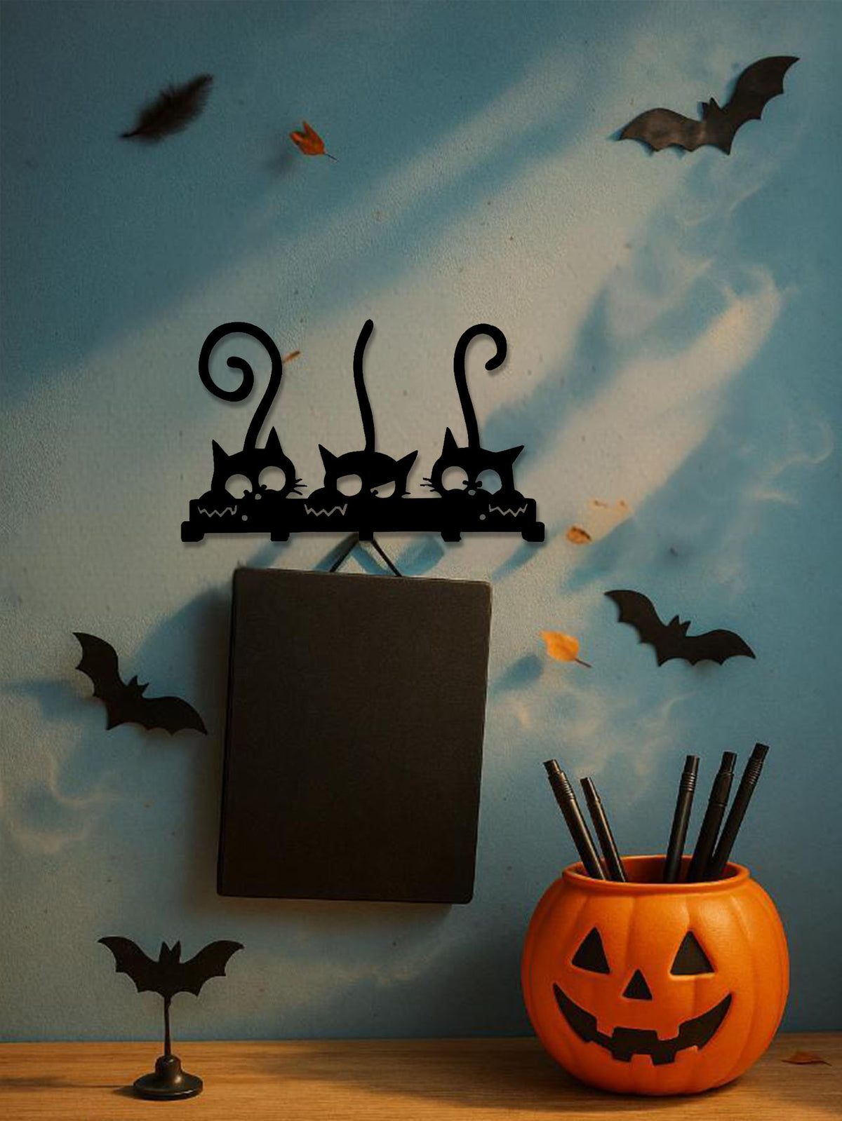 vintage black metal wall coat in use lifestyle