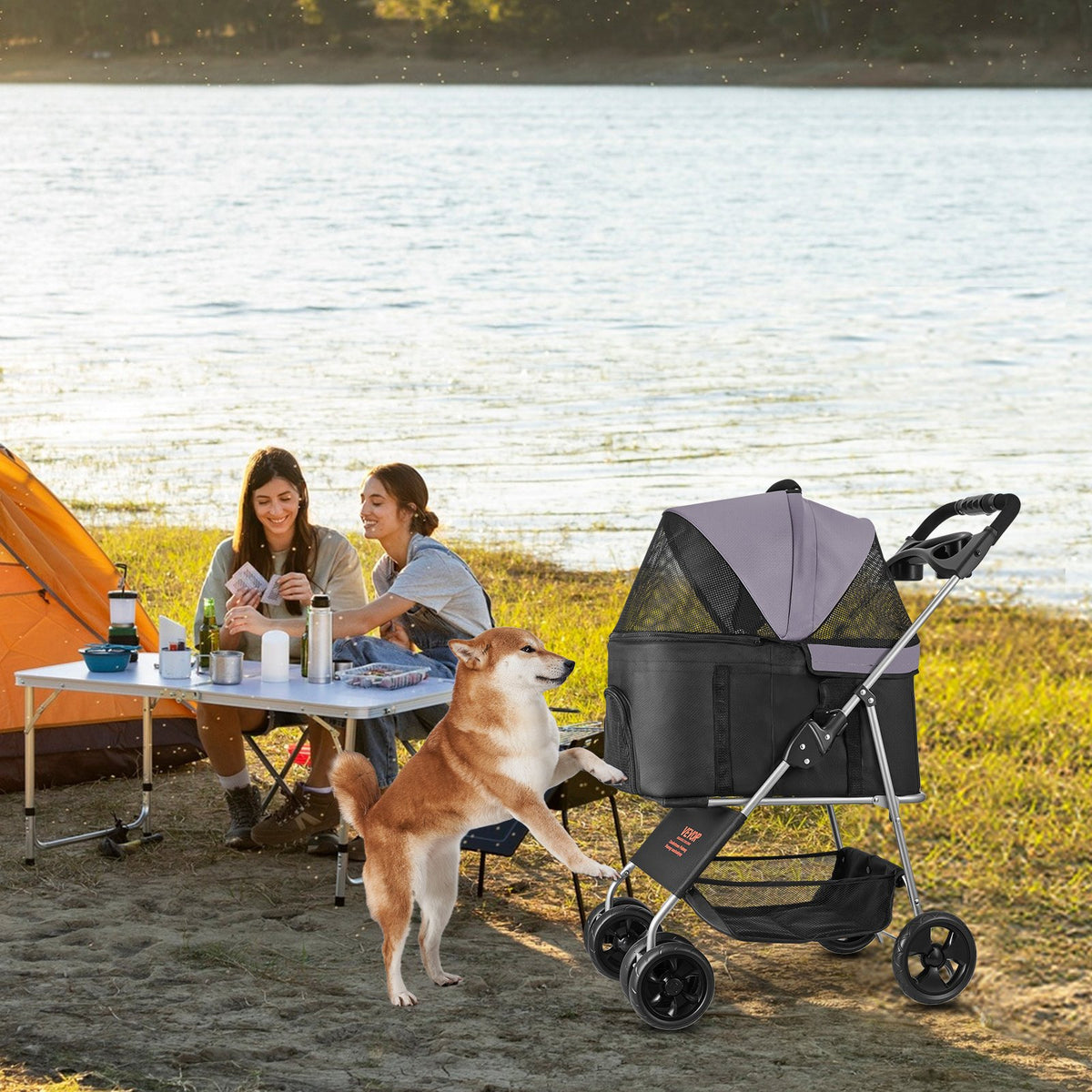 Pet travel stroller with detachable carrier and storage compartment