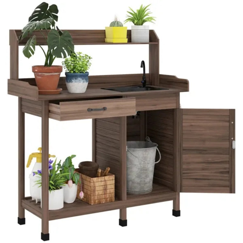 solid wood outdoor potting bench with sink and storage cabinet