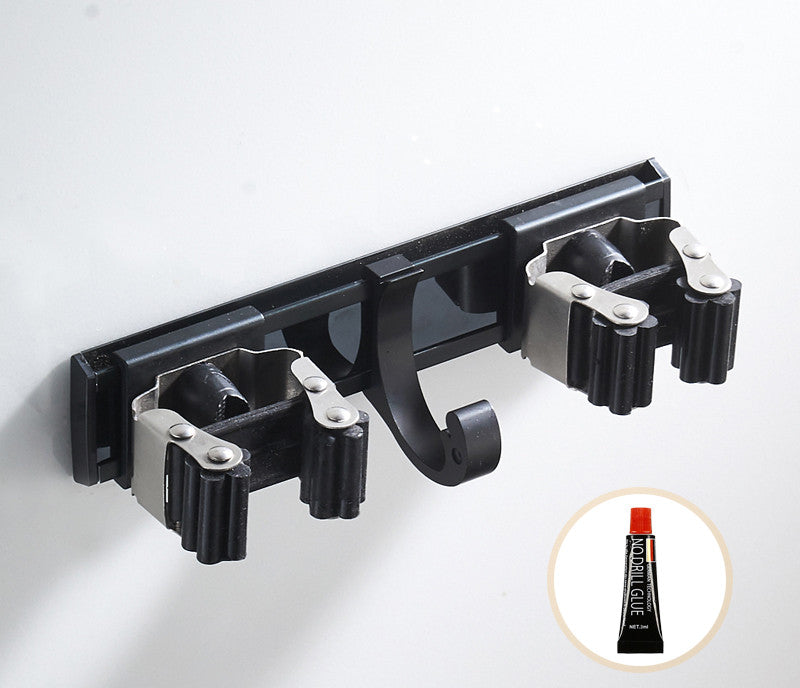black wall mount mop clip in use lifestyle