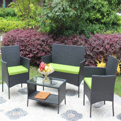 4-Piece Rattan Patio Furniture Set with Green Cushions